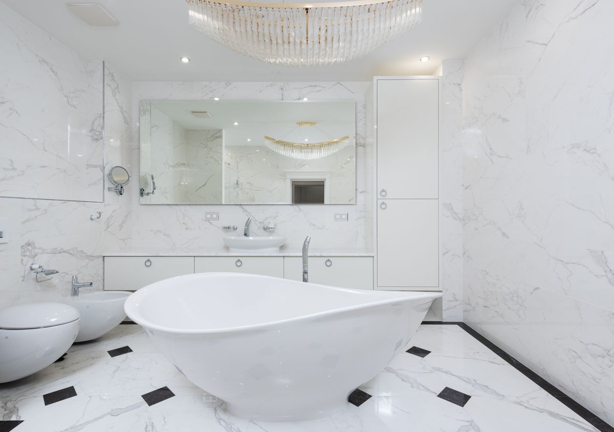 white marble tile installed in luxury bathroom